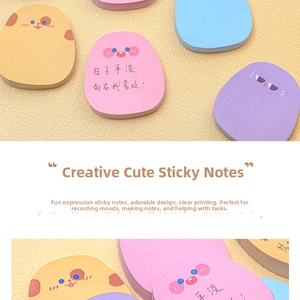 Macro detail of cute macaron-colored cartoon sticky notes with soft animal facial expressions