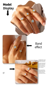 French style titanium steel rings set with opal heart and teardrop design worn on fingers