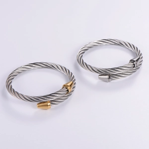 Adjustable stainless steel twisted cable bangles in silver and two-tone gold finish