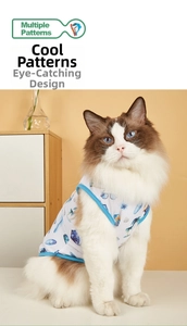 Close-up of summer pet vest with ocean prints on breathable mesh fabric worn by a cat