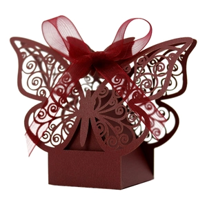 Elegant laser-cut hollow butterfly candy box in deep red pearl paper with silk ribbon