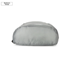 Detail view of the gray foldable backpack bottom featuring durable ripstop fabric and logo