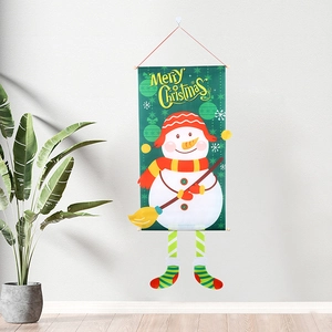 Detail view of snowman Christmas banner decoration with Merry Christmas text on wall