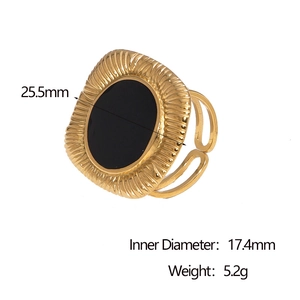 Macro shot of gold square ring with black oval enamel inlay showing dimensions and 5.2g weight