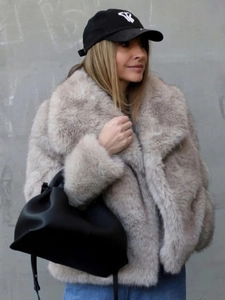 Faux fur winter coat for women in light beige with wide lapels and urban street style