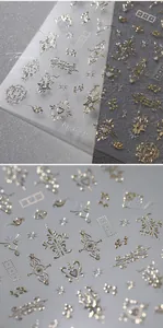Macro view of M-629 gold foil nail stickers with European vintage patterns