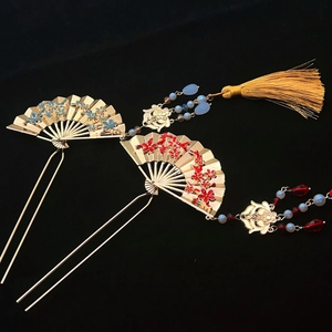 Traditional fan-shaped hair sticks with long tassels in gold metal and floral motifs