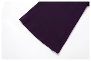 Close-up of seamless four-needle six-thread stitching on purple yoga sportswear fabric
