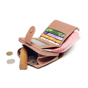 Dusty pink litchi grain women's bifold wallet with multiple card slots and coin pocket