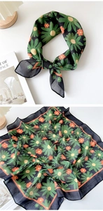 Close-up of floral print cotton linen scarf featuring vintage daisies and soft texture