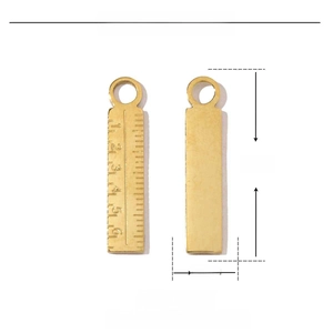 Macro detail of golden stainless steel ruler pendant with 23mm height and 4mm width