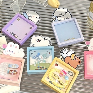 Macro view of colorful cartoon jewelry organizers showing various storage styles