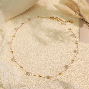 Elegant stainless steel gold bead pearl necklace with a minimalist choker design for women