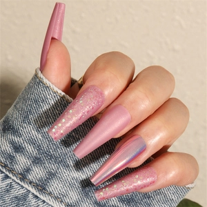 Macro detail of long coffin press-on nails in matte pink, glitter, and holographic aurora finish