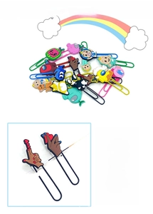 Detail showing colorful PVC cartoon bookmarks with Among Us and Cocomelon characters