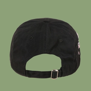 Rear view of black cotton baseball cap showing silver metal adjustment buckle and stitching