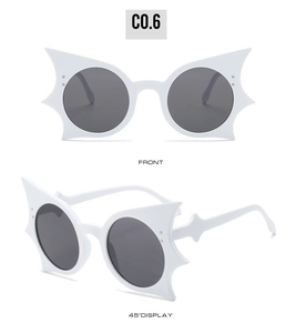 Front and 45-degree angle display of white bat-wing cat-eye sunglasses with grey lenses