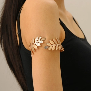 Adjustable golden leaf arm cuff with intricate cutout vein texture for women
