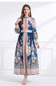 Detail of bohemian floral print on deep blue vintage dress with stand collar and belt