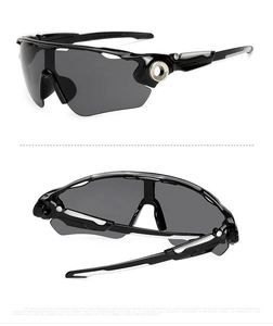 Detail view of sport cycling sunglasses featuring black glossy frame and TAC polarized lens