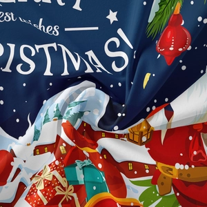 Detail shot of soft fabric texture with Merry Christmas print and holiday patterns