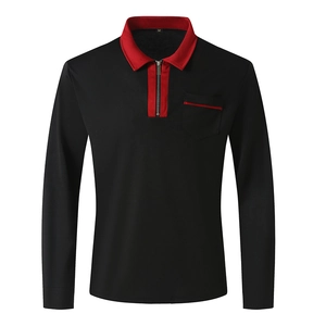 Close-up of black long sleeve polo shirt with red trim detailing and chest pocket