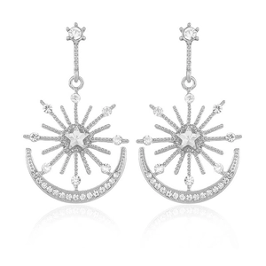 Silver star and moon earrings with clear rhinestones on white background and reflection