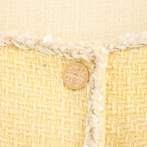 Elegant yellow tweed French dress featuring a square neck, gold buttons and fringe details