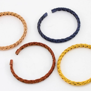 Minimalist twisted cable stainless steel open bracelets in rose gold, blue, brown, and gold