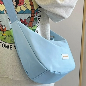 Minimalist light blue nylon dumpling crossbody bag with wide shoulder strap design