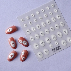Detailed 5D white embossed nail art stickers with heart and butterfly patterns, model TS-272