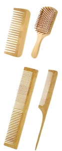 Close-up of a 4-piece bamboo hairbrush set including massage and wide-tooth combs