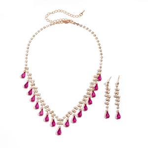 Luxury gold jewelry set with rose red teardrop crystals and sparkling rhinestones