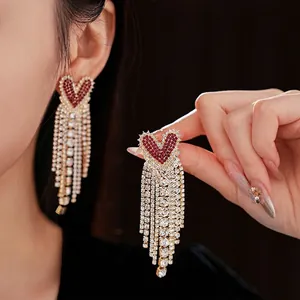 Elegant red heart stud earrings with sparkling tassel fringe for luxury evening style