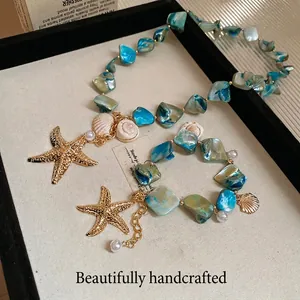 Seaside style necklace set with starfish and shell pendants and blue stones