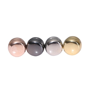 Magnetic scarf clasps in rose gold, gunmetal, silver, and gold on a white background