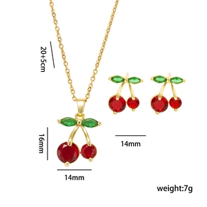 Gold cherry jewelry set with necklace and earrings featuring red crystals and size specs