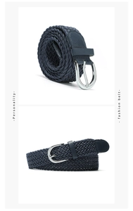 Detailed view of dark blue braided belt with silver pin buckle for jeans and dresses