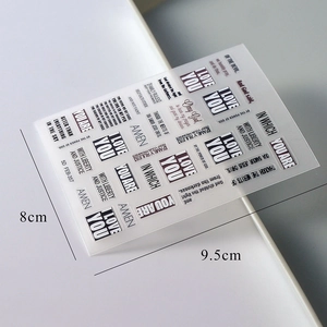 Detailed view of 5D embossed nail art stickers with inspirational English lettering