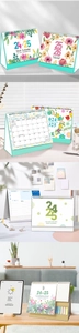 Detail of 2024-2025 desk calendar showing monthly plan sections and memo note functions