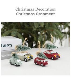 Detailed close-up of retro Christmas car ornaments with sisal trees and rustic twine