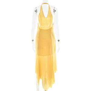 Detail view of the halter neck tie and open back design on a yellow chiffon dress