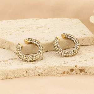 Minimalist C-shaped titanium steel hoop earrings in gold with pavé crystal inlay