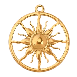 Macro detail of sun-shaped golden stainless steel pendant charm with rays and ring