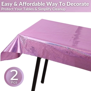Detail of 2-pack pink holographic party tablecloths with shiny metallic surface