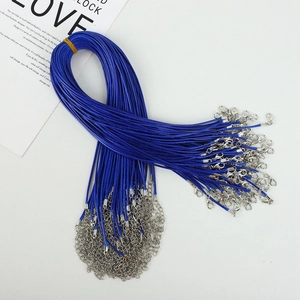 Detail of dark blue wax cord necklace string with silver lobster clasp and extender