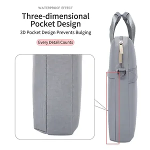 Waterproof light grey laptop sleeve bag with a sleek handle and anti-bulge side pocket design