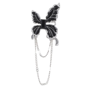 Gothic silver butterfly brooch with black enamel dripping and dangling chain tassels