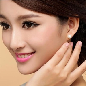 Elegant S925 sterling silver studs featuring natural white freshwater pearls for women
