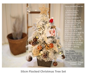 Close-up of a 50cm white and gold Christmas tree with felt pot and festive ornaments